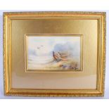 A FRAMED ROYAL WORCESTER PORCELAIN PLAQUE by James Stinton, depicting four pheasants within landsca