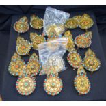 Quantity of Tibetan bronze decorative plaques. 11.5cm