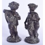 A PAIR OF 19TH CENTURY FRENCH BRONZE FIGURES OF A GIRL AND BOY modelled wearing wreaths. 16.5 cm hi
