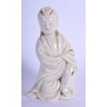 A 19TH CENTURY CHINESE BLANC DE CHINE FIGURE OF GUANYIN of small proportions. 9.5 cm high.