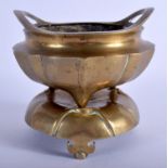 A 19TH CENTURY CHINESE TWIN HANDLED CENSER ON STAND Qing, bearing Xuande marks to base. 1384 grams.