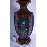 A RARE LARGE 19TH CENTURY JAPANESE MEIJI PERIOD LACQUERED SHIBAYAMA VASE decorated with panels of f