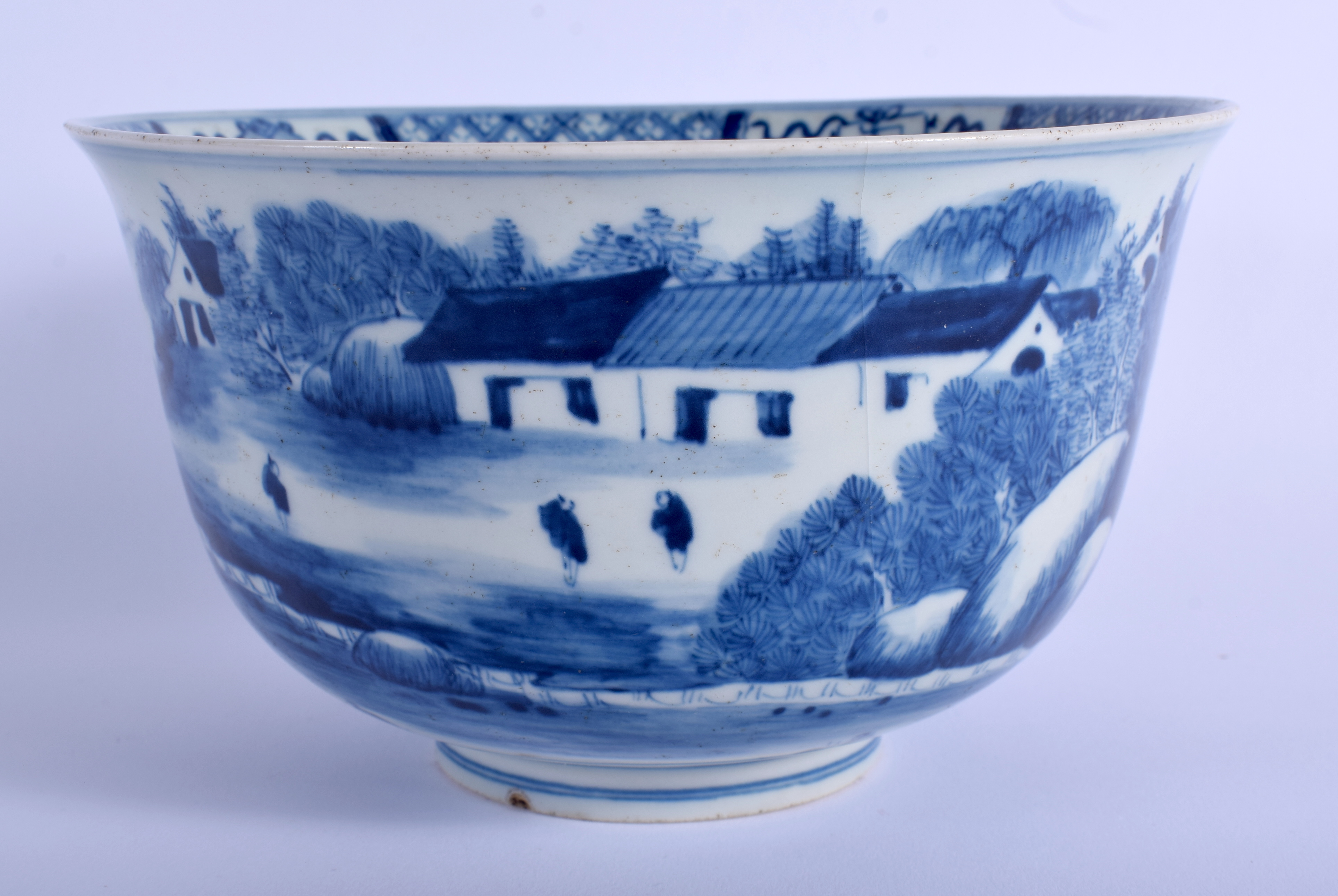 A CHINESE QING DYNASTY BLUE AND WHITE PORCELAIN BOWL Kangxi mark and possibly of the period, painte