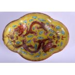 A 19TH CENTURY CHINESE FAMILLE JAUNE PORCELAIN LOBED DISH painted with dragons. 8.5 cm x 6.5 cm.
