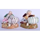 A RARE PAIR OF 19TH CENTURY ENGLISH PORCELAIN FIGURES modelled as two drunken males upon barrels. 8