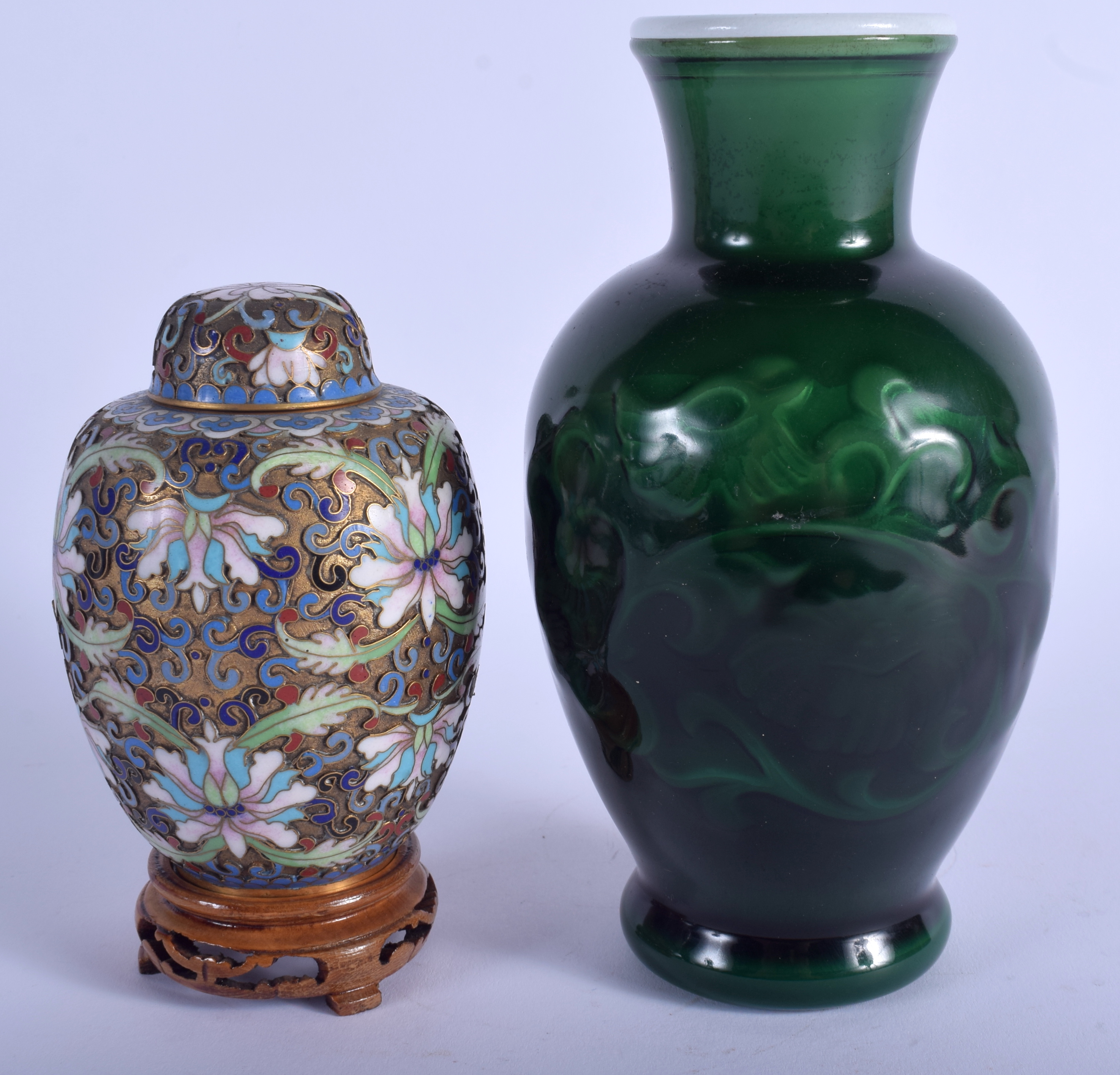 AN EARLY 20TH CENTURY CHINESE CLOISONNE ENAMEL VASE AND COVER together with a Peking style vase. La