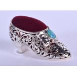 A SILVER SHOE PIN CUSHION. 4.5 cm wide.