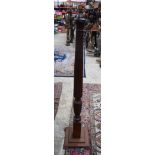 A wooden Lampstand. 152 cm high
