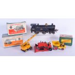 THREE BOXED DINKY CARS together with a train. (4)