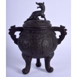 A 19TH CENTURY JAPANESE MEIJI PERIOD TWIN HANDLED BRONZE CENSER AND COVER decorated with archaic sy