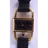 AN 15CT GOLD KUTCHINSKY RIDERS WATCH. Dial 2.25 cm x 1.5 cm.