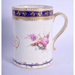 Derby mug moulded with ribs painted with two sprays of flowers under a Smith’s blue border with gi