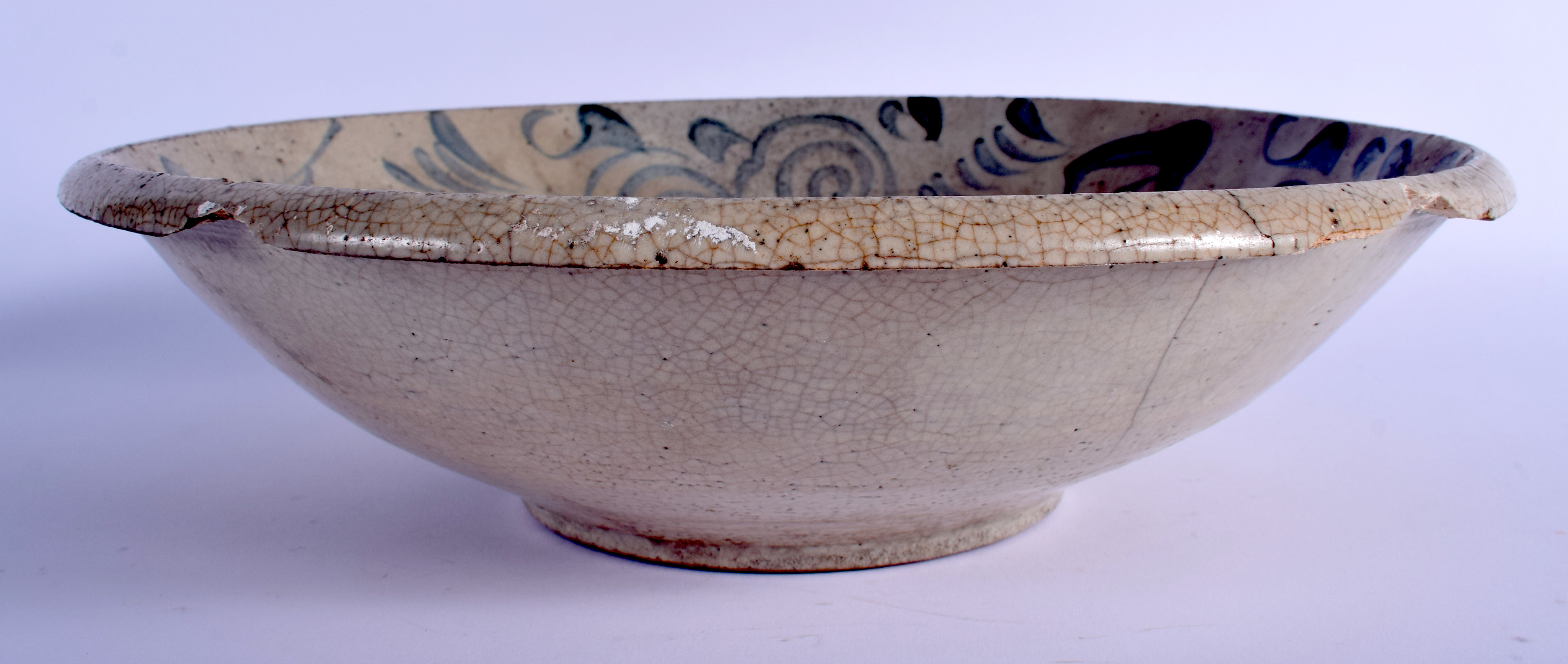 AN 18TH CENTURY CHINESE VIETNAMESE BLUE AND WHITE STONEWARE BOWL painted with swirling motifs. 32 - Image 2 of 4