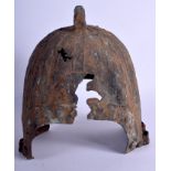 AN ASIAN BRONZE HELMET possibly early Chinese. 31 cm high.