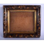 AN EARLY 19TH CENTURY BLACK LACQUER PHOTOGRAPH FRAME painted with gilded shells and foliage. 34 cm