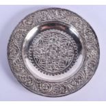 A MIDDLE EASTERN SILVER DISH. 52 grams. 13 cm diameter.