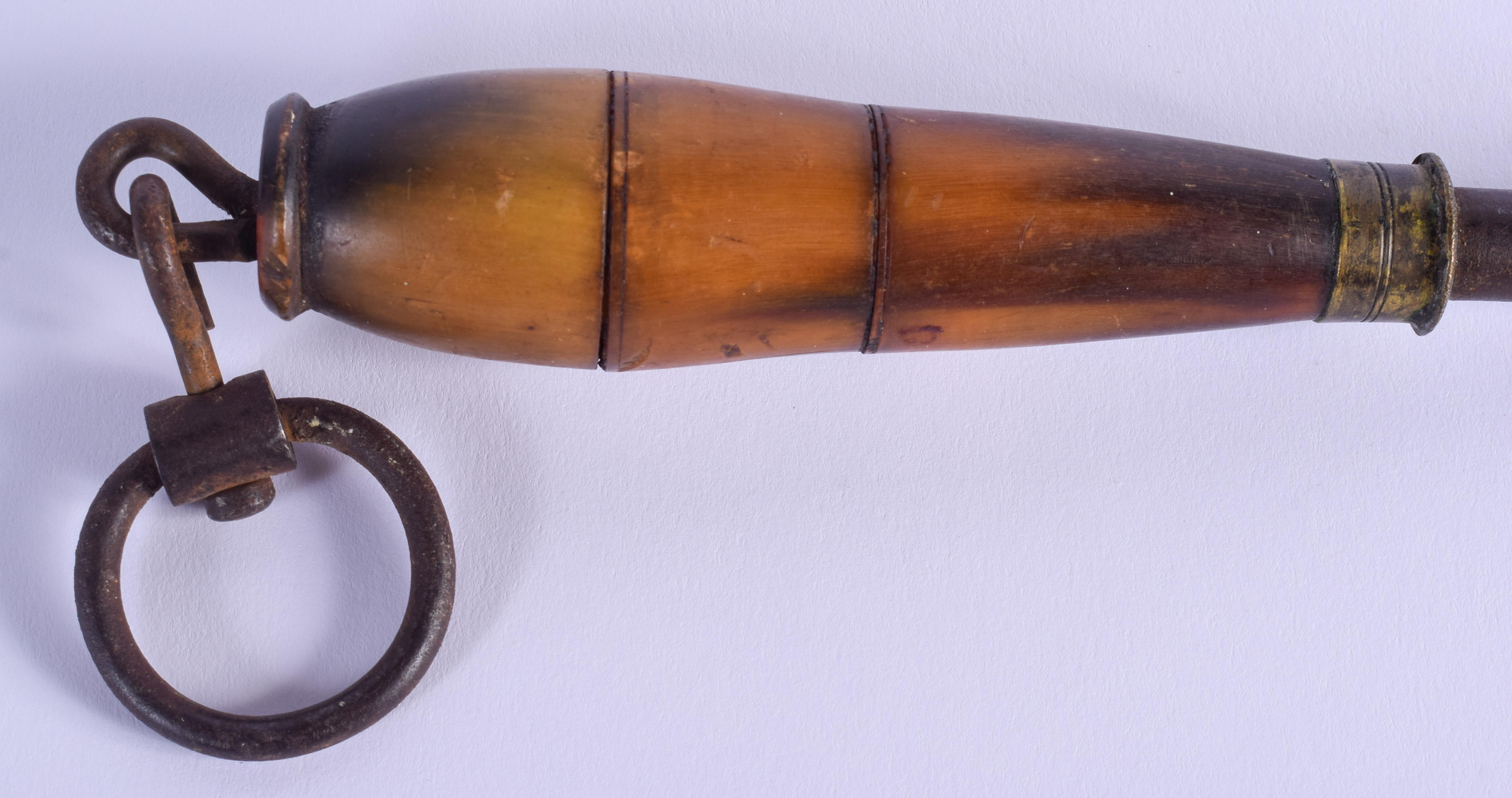 A 19TH CENTURY RHINOCEROS HORN HANDLED SHARPENING STEEL. 35 cm long. - Image 2 of 3