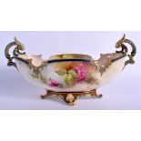 Royal Worcester fine boat shaped vase painted with Hadley style roses signed R. Austin. 30cm long,