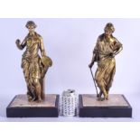 A LARGE PAIR OF 19TH CENTURY EUROPEAN GRAND TOUR BRONZE FIGURES modelled as standing females upon ma