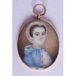 AN 18TH/19TH CENTURY GOLD MOUNTED IVORY PORTRAIT MINIATURE. 2.75 cm x 3 cm.