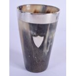 AN ANTIQUE SILVER MOUNTED HORN BEAKER. 10 cm high.