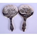 A LARGE PAIR OF ANTIQUE SILVER MIRRORS decorated with cherubs. 27 cm x 15 cm.