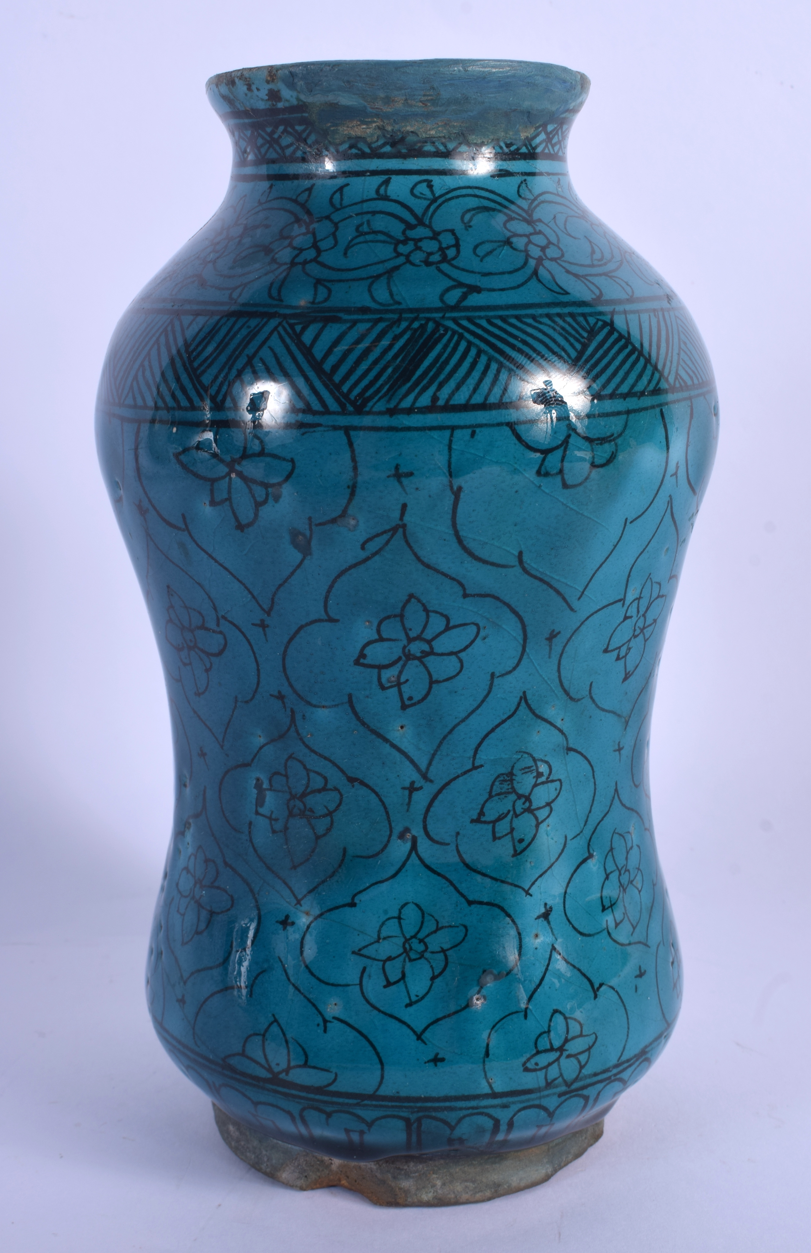 AN EARLY MIDDLE EASTERN KASHAN ISLAMIC TURQUOISE GLAZED ALBARELLO JAR painted with flowers. 21.5 cm - Image 2 of 3