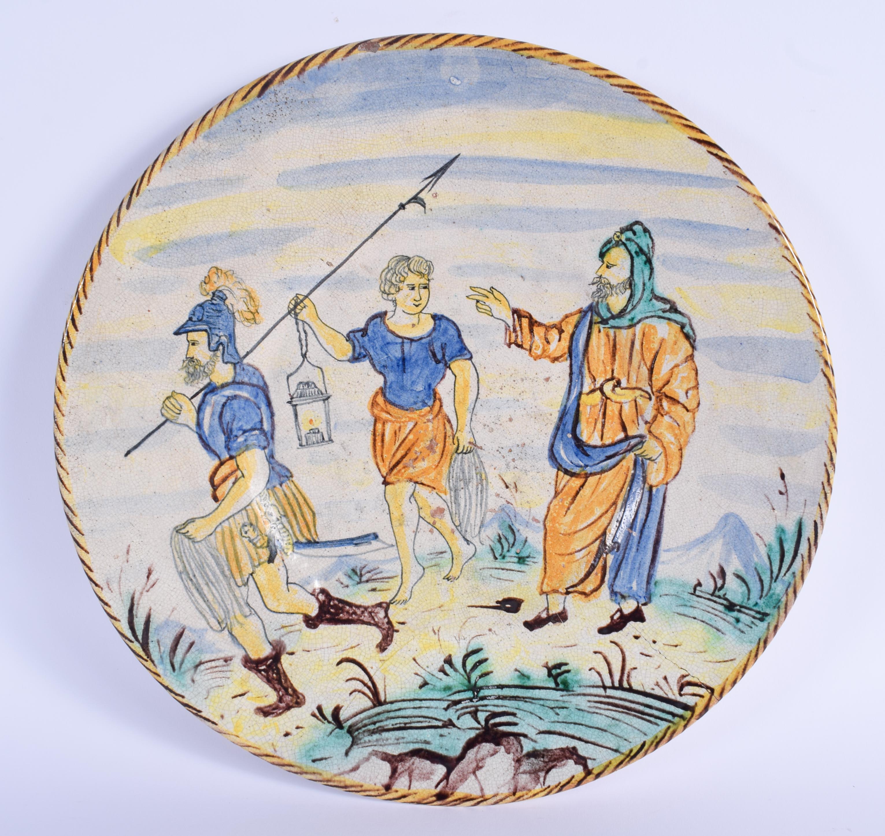 A LARGE 19TH CENTURY CONTINENTAL MAJOLICA FAIENCE DISH painted with figures. 36 cm diameter.