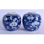 A PAIR OF 19TH CENTURY CHINESE BLUE AND WHITE GINGER JARS Kangxi style. 13 cm x 11 cm.