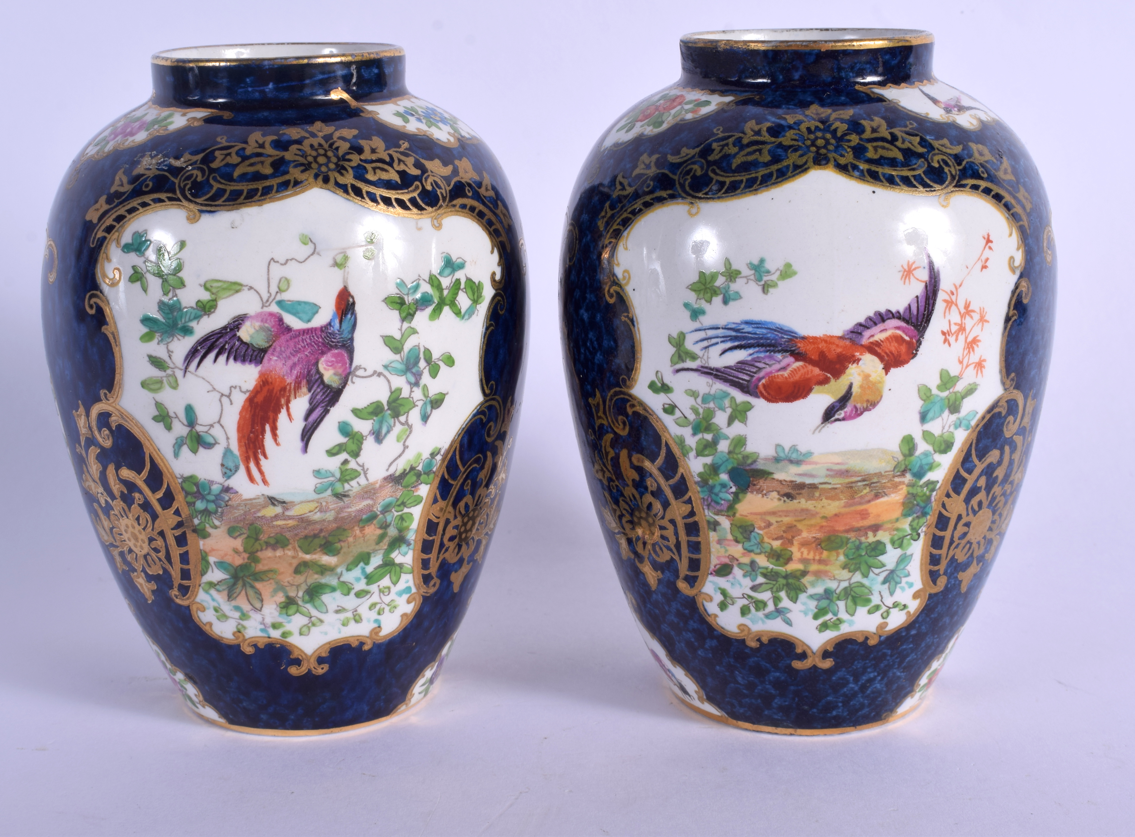 A PAIR OF ANTIQUE BOOTHS BLUE SCALE VASES. 12.5 cm high.