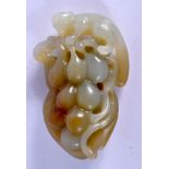 A CHINESE CARVED GREEN MUTTON JADE FRUITING POD 20th century, overlaid with a squirrel. 6.5 cm x 3.