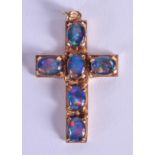 A VINTAGE 9CT GOLD AND OPAL CROSS. 6.7 grams. 4 cm x 2.5 cm.