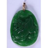A CHINESE CARVED GOLD MOUNTED JADE PENDANT 20th Century. 4.5 cm x 6 cm.