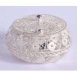 A SILVER FILIGREE BOX. 11 grams. 3.5 cm x 2.5 cm.