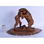 A RARE EARLY 20TH CENTURY BAVARIAN BLACK FOREST CARVED WOOD FIGURAL GROUP depicting a bear wrestling