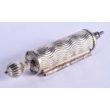 A VERY UNUSUAL ANTIQUE WHITE METAL REVOLVING NEEDLE HOLDER. 8 cm wide.