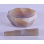 A RARE CONTINENTAL AGATE PESTLE & MORTAR. 5.5 cm wide. (2)