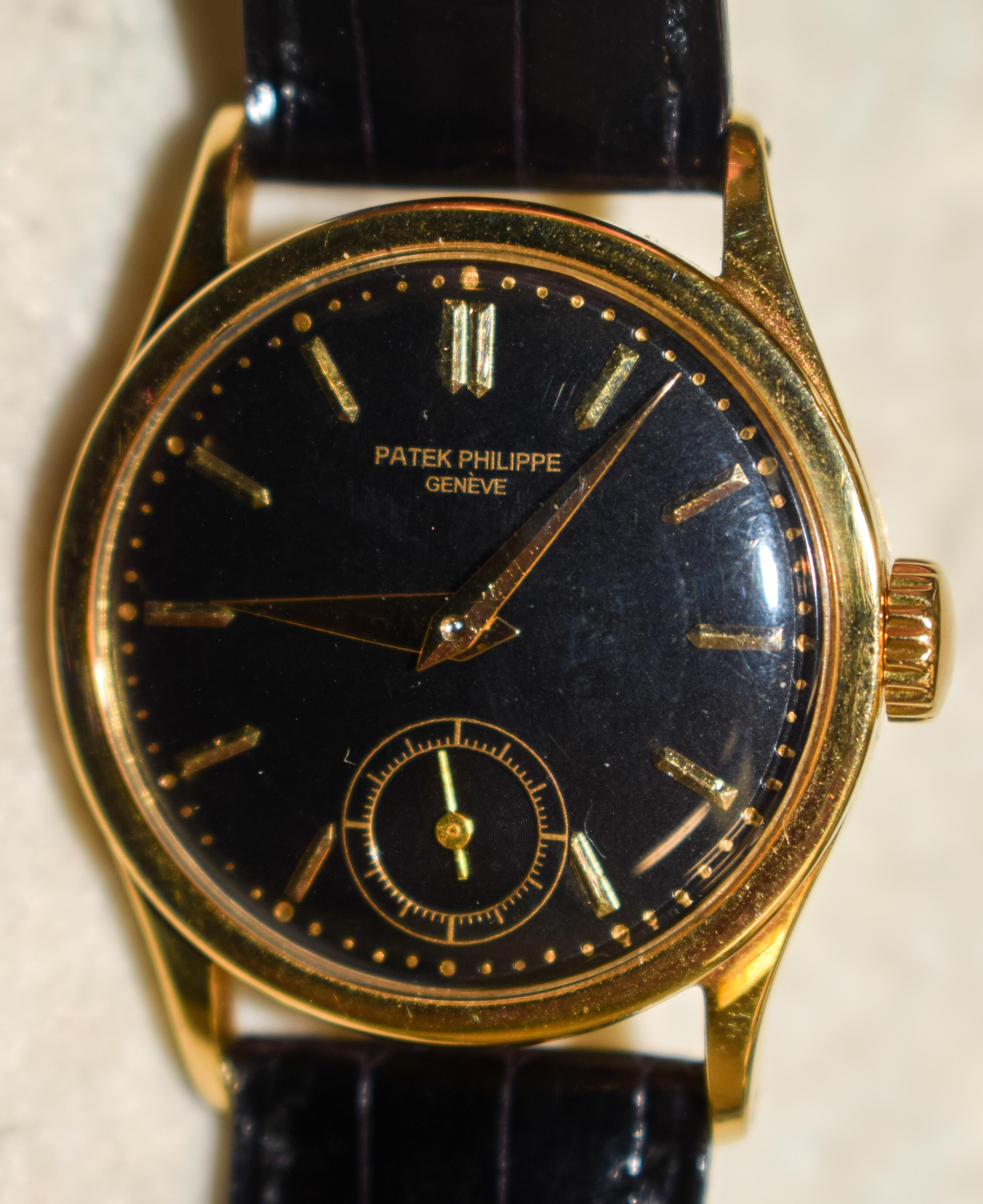 A RARE 18CT GOLD PATEK PHILIPPE BLACK DIAL WRISTWATCH with 18ct gold strap. Dial 3 cm diameter, Stra - Image 8 of 16