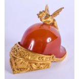 AN EARLY 19TH CENTURY ENGLISH ORMOLU AND AGATE HELMET PAPER WEIGHT with dragon finial. 6.5 cm x 6 cm