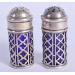 A PAIR OF SILVER CONDIMENTS. 5.5 cm high.