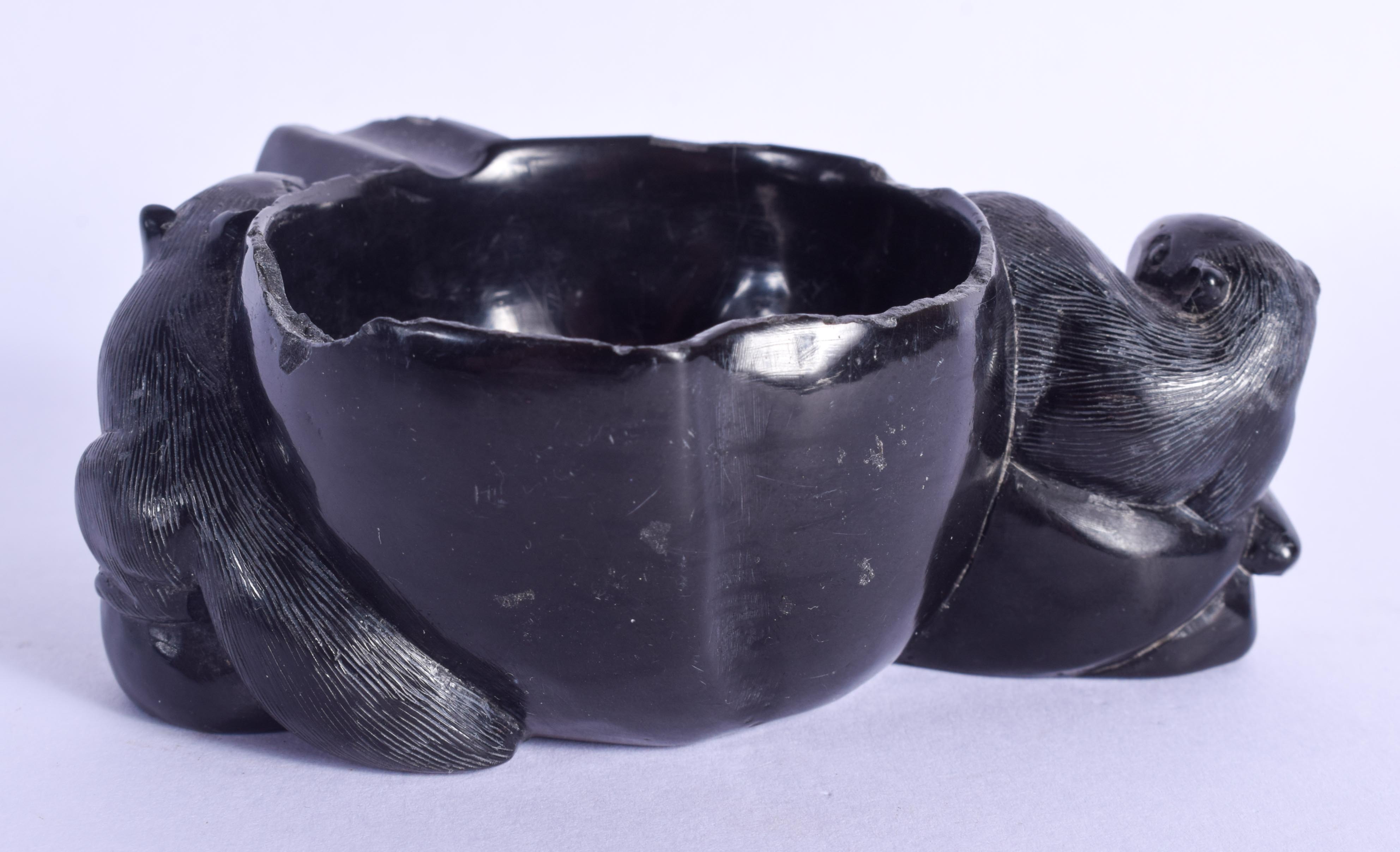 AN EARLY 20TH CENTURY CHINESE CARVED BLACK STONE BRUSH WASHER. 9 cm x 6 cm. - Image 2 of 4