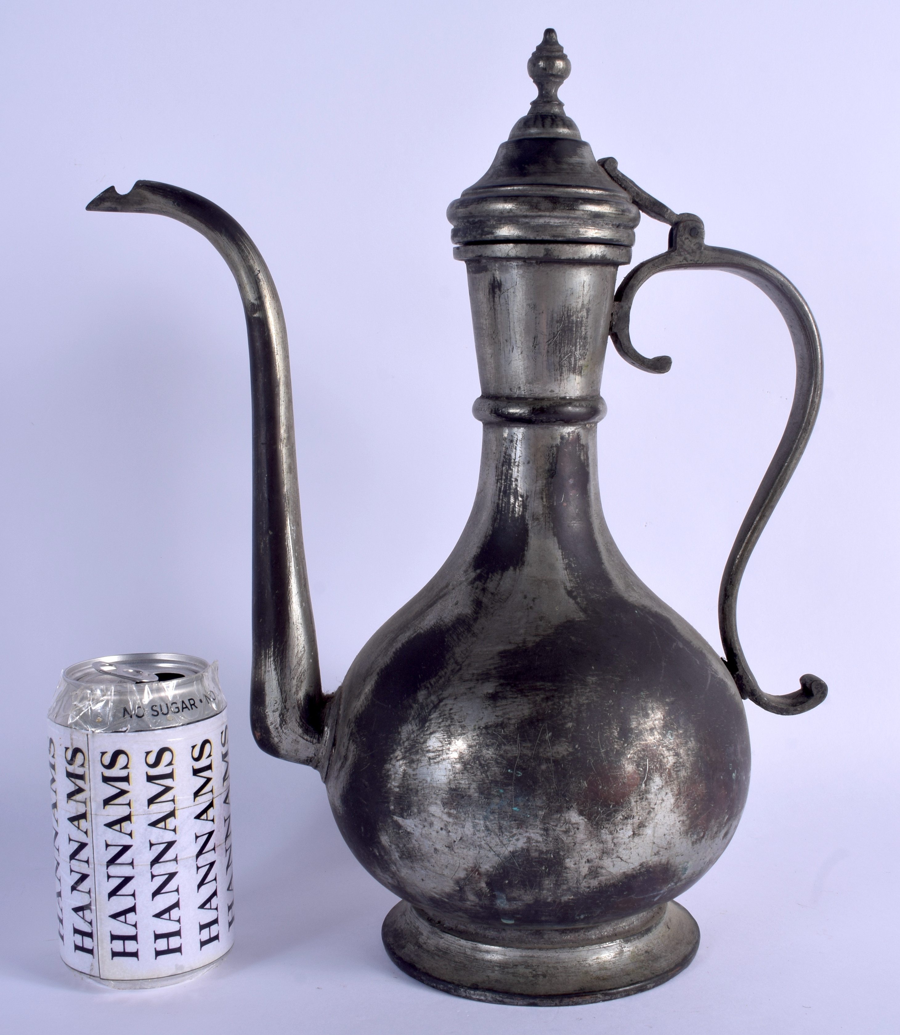 A 19TH CENTURY MIDDLE EASTERN ISLAMIC EWER. 34 cm x 18 cm.