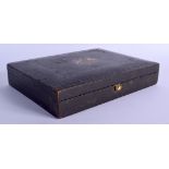 AN ANTIQUE MOROCCAN LEATHER ROYAL PATENT CRESTED BOX. 30 cm x 22 cm.