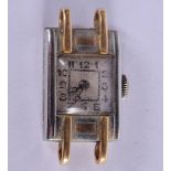 AN ART DECO 18CT GOLD WATCH. 8.4 grams overall. 2.75 cm x 1.25 cm.