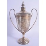 AN ART NOUVEAU SILVER TWIN HANDLED SILVER TROPHY & COVER presented to the Border Coursing Club. Ches