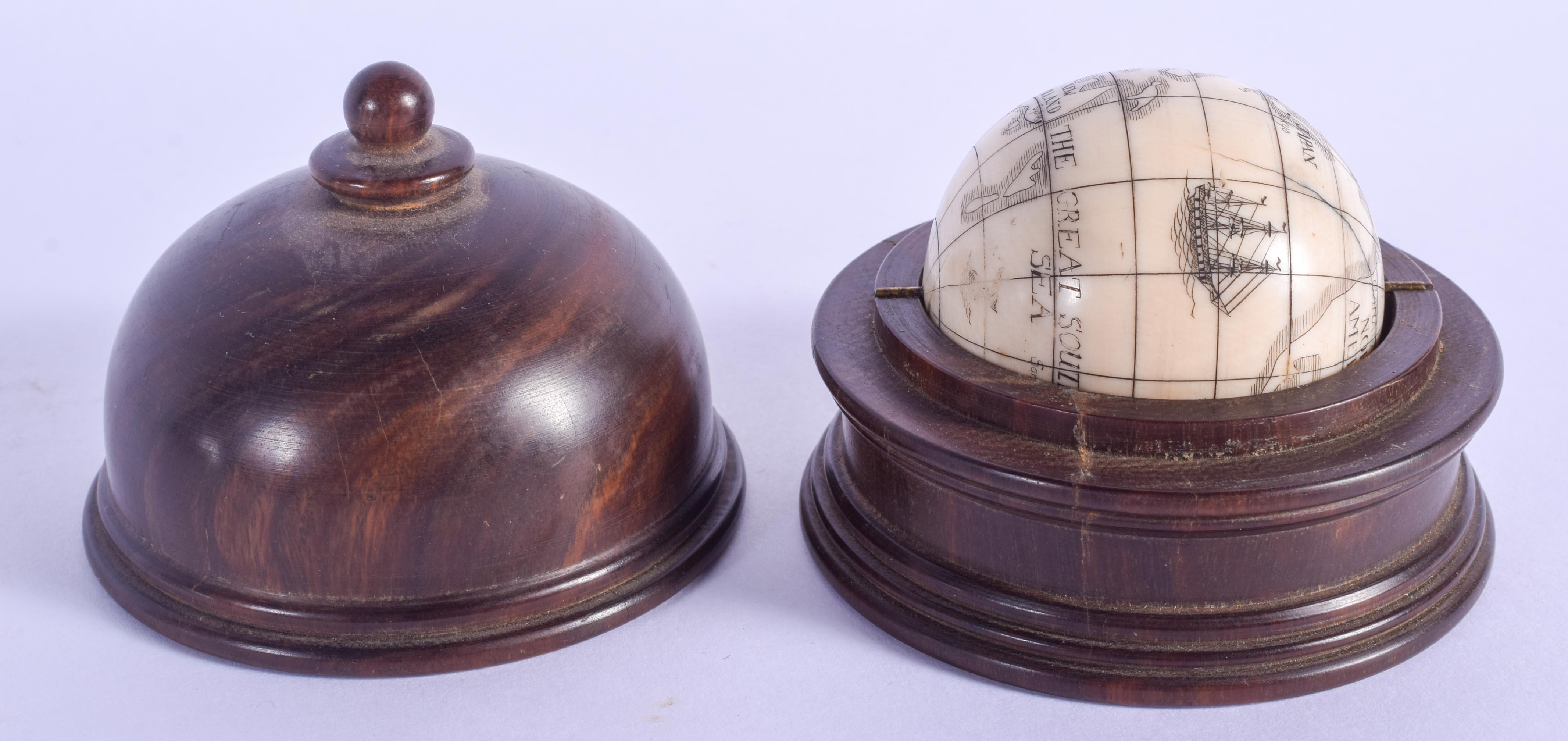 AN EARLY 20TH CENTURY CONTINENTAL CARVED IVORY SPINNING GLOBE within a fitted treen box and cover. I - Image 2 of 5