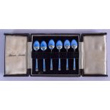 SIX ART DECO SILVER AND ENAMEL HARRODS SPOONS. 6.5 cm long. (6)