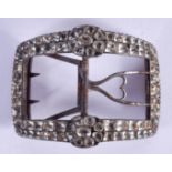 A VINTAGE WHITE METAL GEM SET BUCKLE. 35 grams. 8 cm x 4 cm.