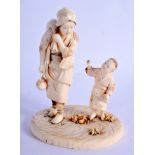 A 19TH CENTURY JAPANESE MEIJI PERIOD CARVED IVORY OKIMONO modelled as a female and roaming boy. 13 c