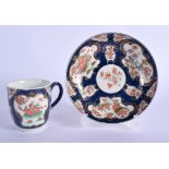 18th c. Worcester coffee cup and saucer painted in kakiemon style with panels of oriental flowers in